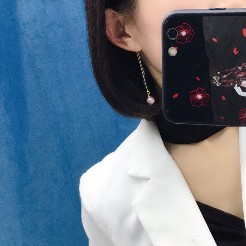 Natural fresh water pearl earrings are 8 - 9mm long section